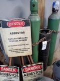 2 oxygen tanks, 1 act tank, danger signs