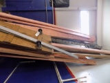 Large lot of lumber and aluminum walking plank