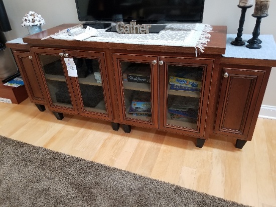 Entertainment console cabinet with glass doors