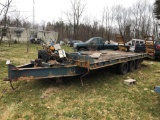 Triaxle deck-over equipment trailer