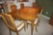 Oak dining table, 6 chairs, 2 extra leaves