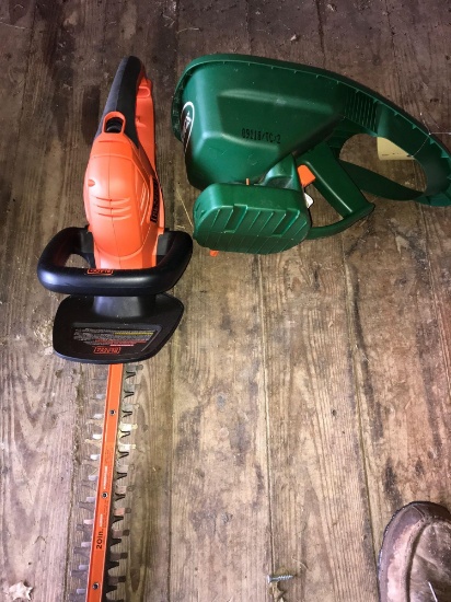 Elec hedge trimmer, hand broadcaster