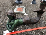 Concrete mermaid garden statue