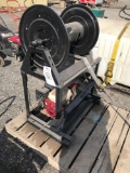 Honda 4hp engine with pump and hose reel