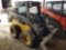New Holland LS160 skid loader, remotes, material bucket, 6,135 hours