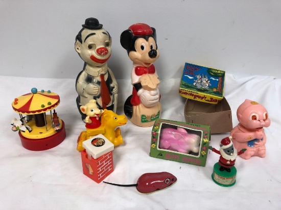 Vintage Mickey Mouse bank, clown bank, and other vintage toys