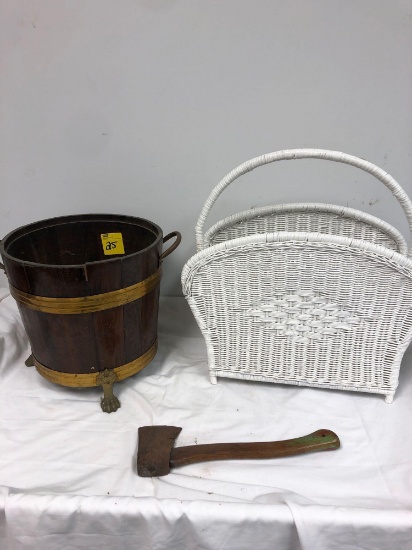 Wicker magazine rack, wooden bucket, ax
