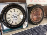 Two wall clocks approximately 18 inches wide.