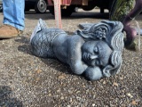 Concrete lying down mermaid