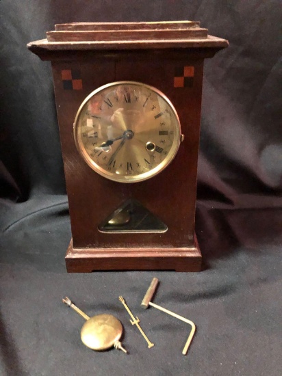 Oak mantle clock.
