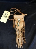 Wampum bag with bone and bead accents