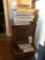 Stenciled cabinets, carving set, art work, small 4-drawer chest, and books