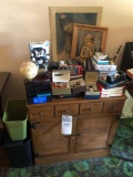 Cabinet and contents. Books, watches, paper shredder, and small globe