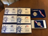 2000-2005 proof sets. 1986 Liberty dollar and half dollar coins