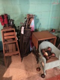 Golf clubs, stepladder, chair and type writer stand