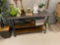 Metal base solid surface coffee table