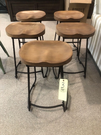Five rebar design base metal stools. Carved wood seats.