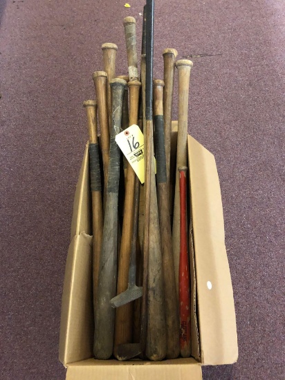 Box of wooden bats and wooden golf clubs