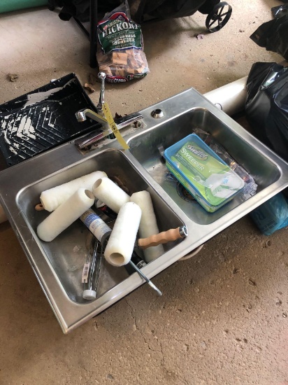 Stainless steel sink and painting supplies