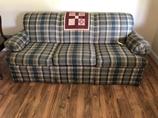 Plaid sofa and matching armchair