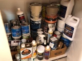 Cupboards full of painting supplies