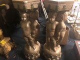 2 cherub pedestals