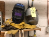 2 welding helmets and welding gloves