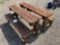 Two wood convertible bench tables