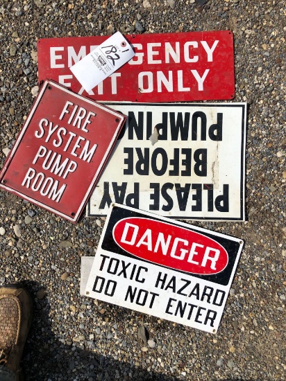 Four metal signs. 8 inches up to 14 inches.