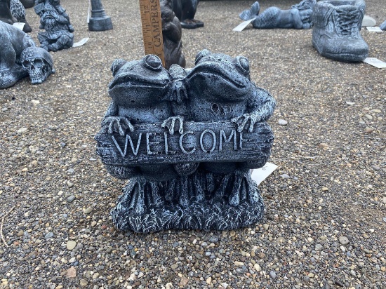 Concrete frog welcome sign