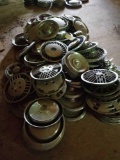 Large lot of hubcaps