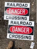 2 metal Railroad crossing signs.