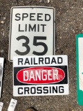 Metal Railroad crossing sign, speed limit sign.