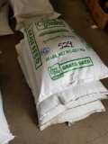 4 bags grass seed - bid x 4