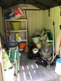Contents of shed includes copper boiler, planters and yard tools