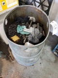 Metal Barrel Full of Shavings and Parts