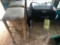 Two stools, charcoal grill