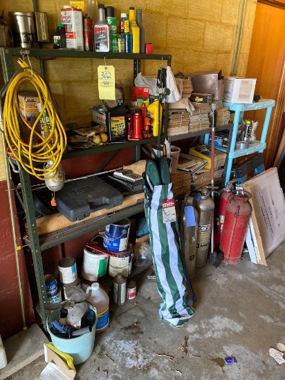 Two metal shelves and one plastic shelf and contents