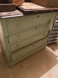 Antique green four drawer chest with glass pulls