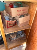 Contents of wood cabinets, old glass bottles, metal lunch pails, minerals lapidary, paints