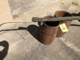 Two small nail kegs. Recurve bow