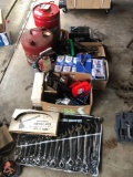 Wrenches, battery charger, gas cans, adjustable swivel axe