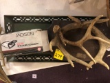 Antlers, welding goggles, decorative metal tray