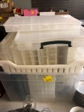 Huge stack of plastic fishing organizers with some fishing tackle