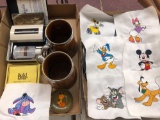 Record cleaner, embroidered Disney items, Lord Nelson pottery cups