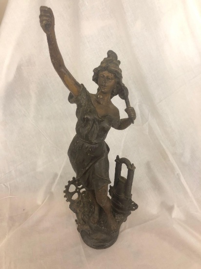 Cast metal stature, girl with industrial parts