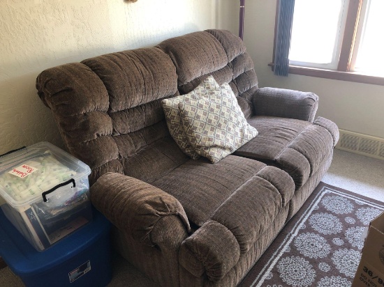 Brown recliner and loveseat