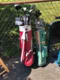 2 sets of golf clubs