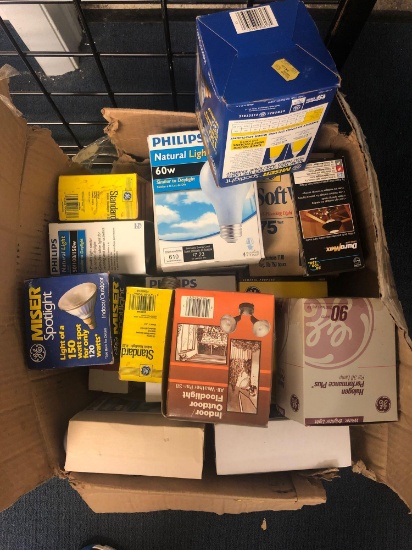 Box of various light bulbs and floodlights