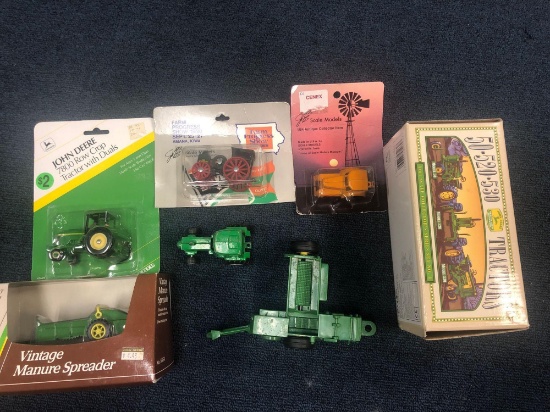 John Deere and Farm Progress show diecast tractors in packages 2 with no package